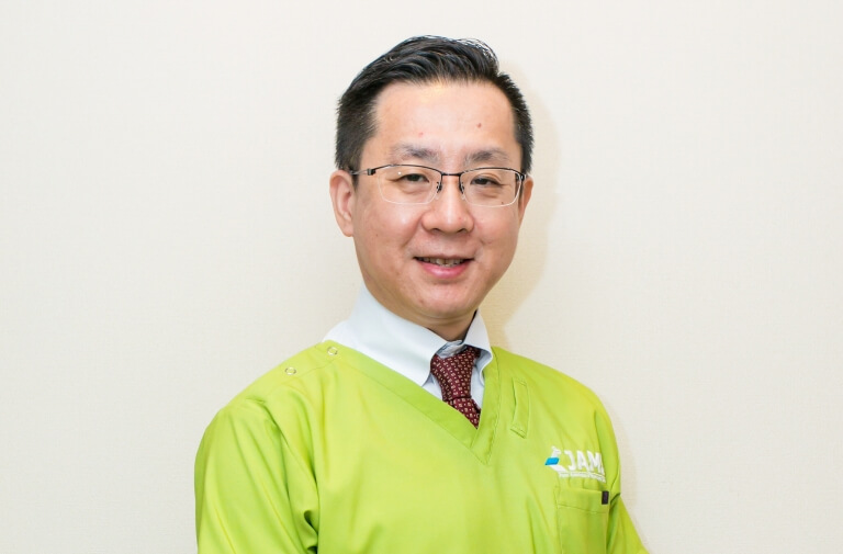 愛歯科医院　院長　金明善